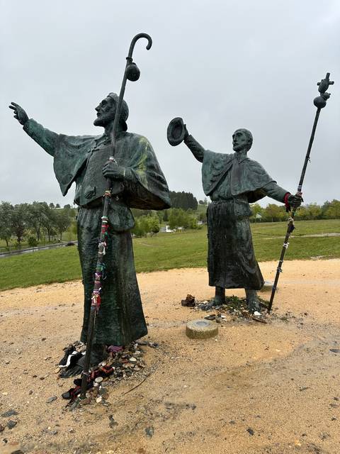A waymarker figure on the road to Santiago.